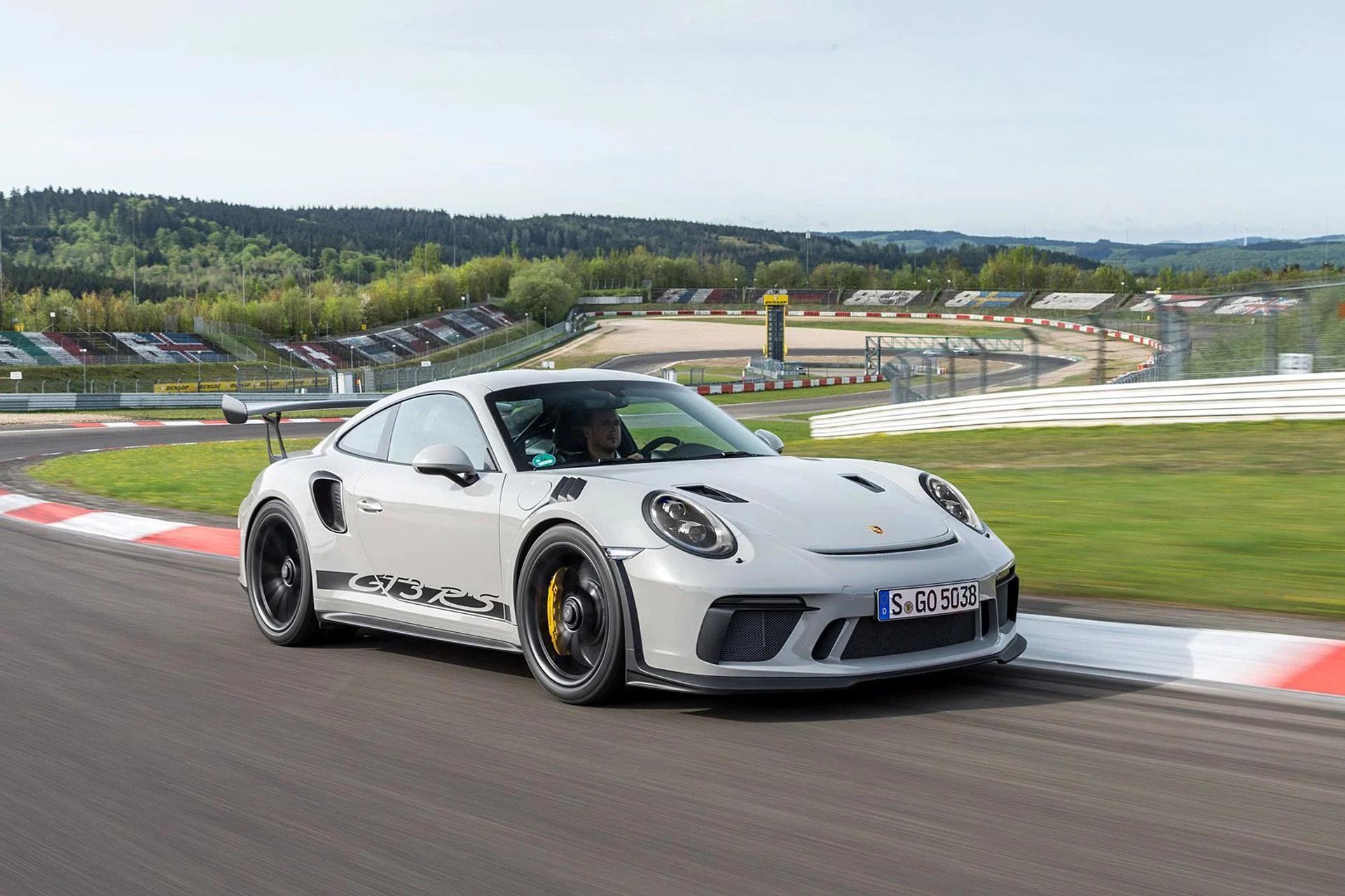 porsche 911 GT3 RS driving on race track