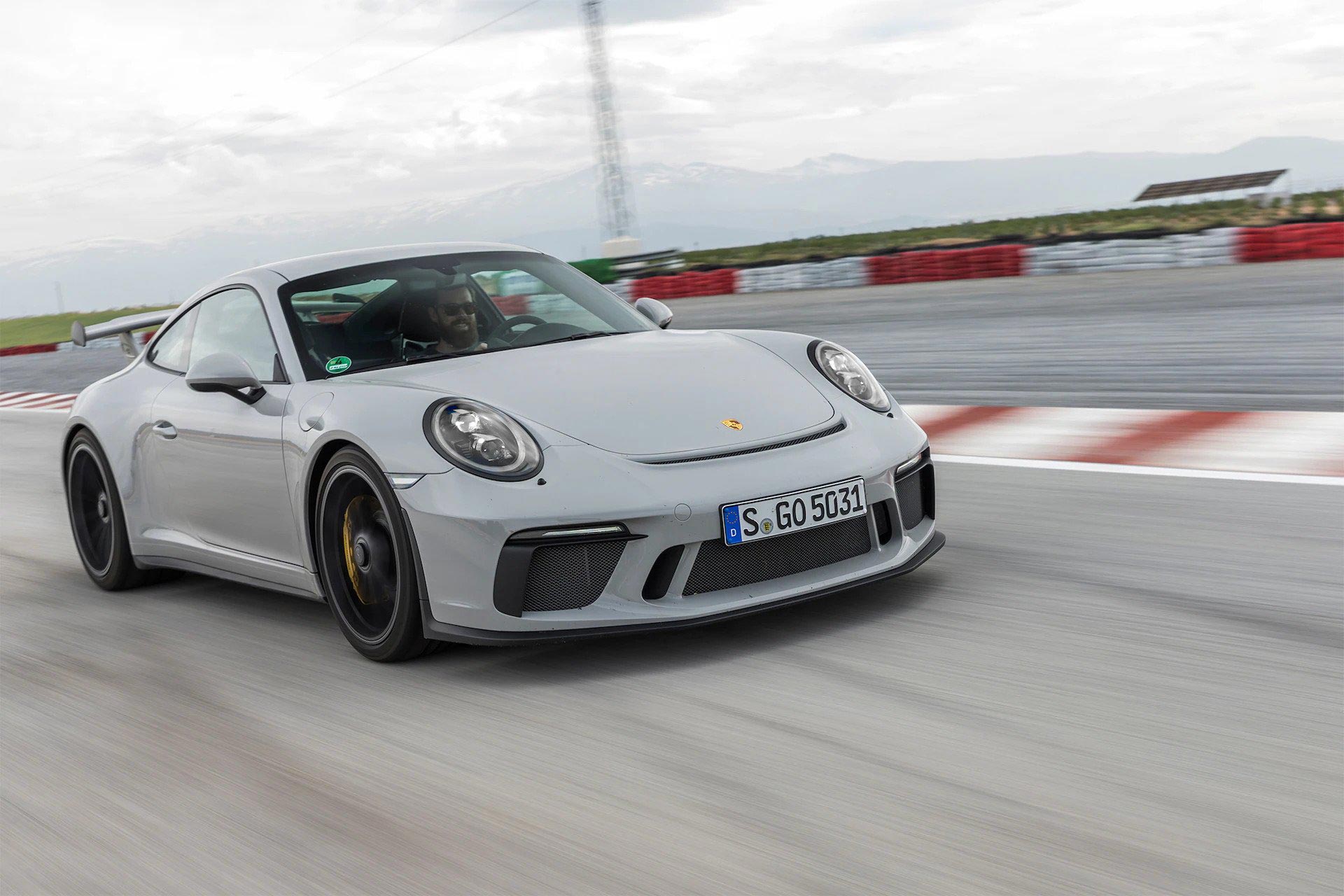 porsche 911 GT3 driving on race track