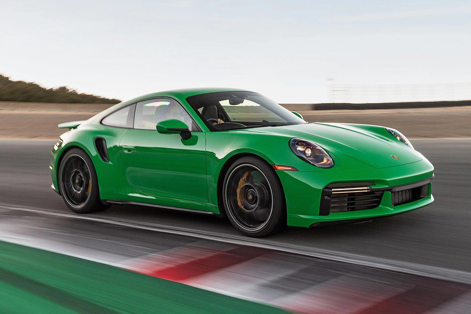 porsche 911 turbo driving on race track