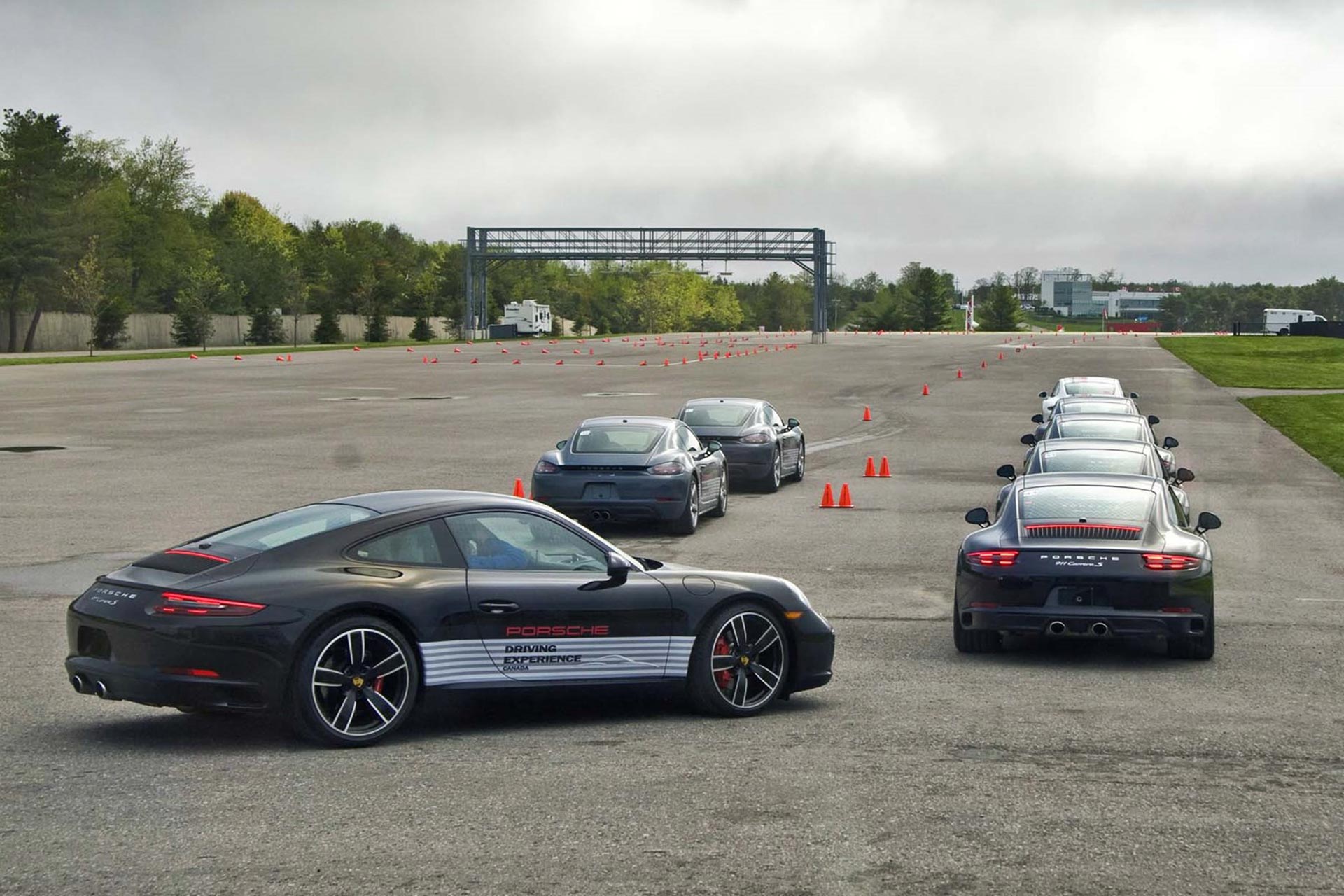 porsche 911 cars parked on test track