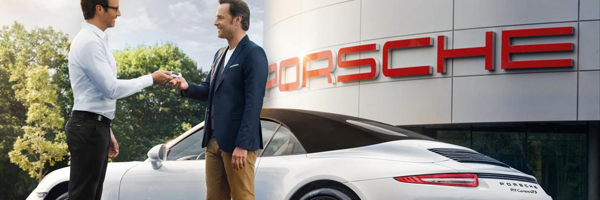 man buying porsche