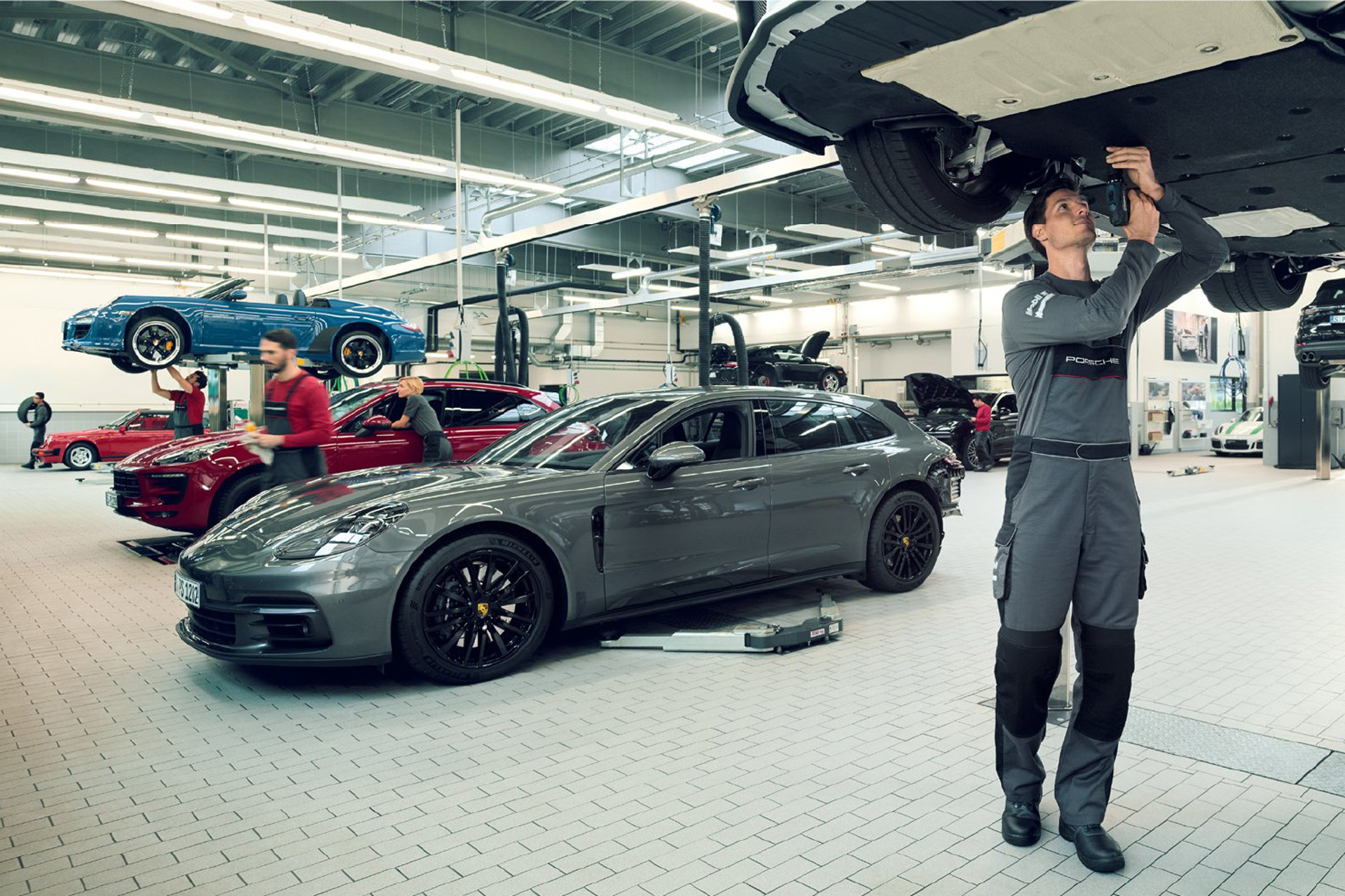 mechanic working under car